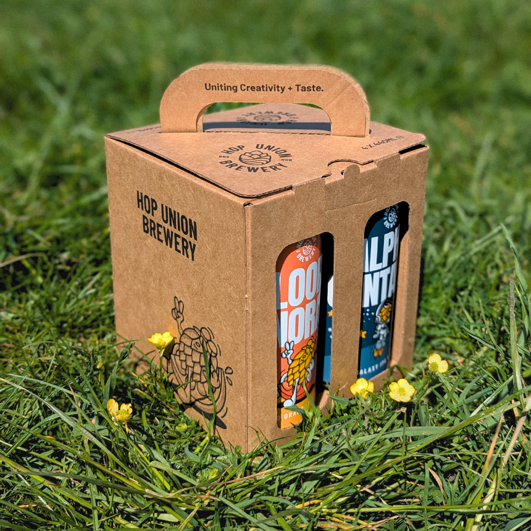 A special gift-pack box containing four cans of beer from Hop Union Brewery Bristol, with each can labeled with different beer names.